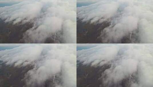 日出云海中的风力发电机风车风电航拍实时高清在线视频素材下载