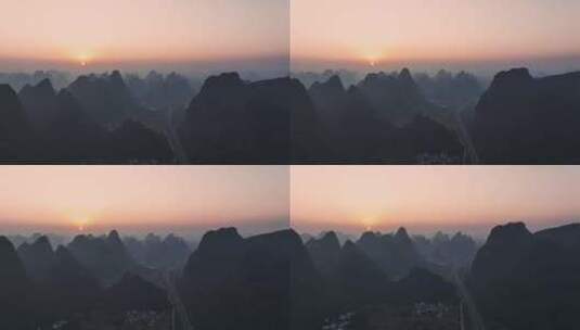 日出时分桂林喀斯特地貌峰林间的高速公路高清在线视频素材下载