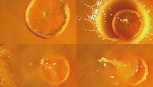 新鲜橙子碎片落入橙汁中溅起水花高清在线视频素材下载