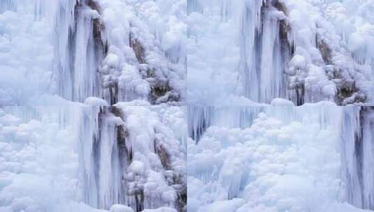 山间冰瀑与平静湖水景观高清在线视频素材下载