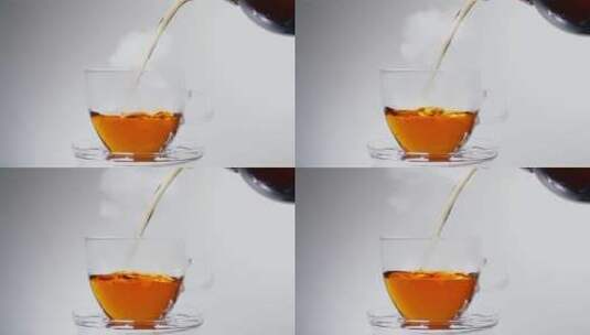 把热茶倒在水晶杯子中高清在线视频素材下载
