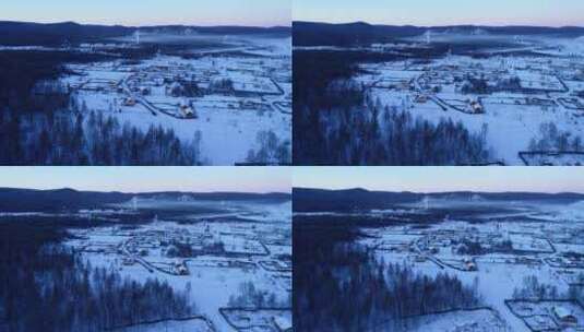 航拍极寒中的林区雪村高清在线视频素材下载