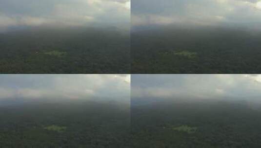 在多云的日子里从高处看到的巨大森林高清在线视频素材下载