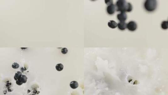 慢镜头拍摄新鲜爆浆蓝莓落入牛奶创意视频高清在线视频素材下载
