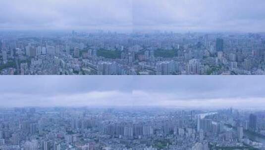 广州城市密集高楼建筑与暴雨天气乌云航拍高清在线视频素材下载