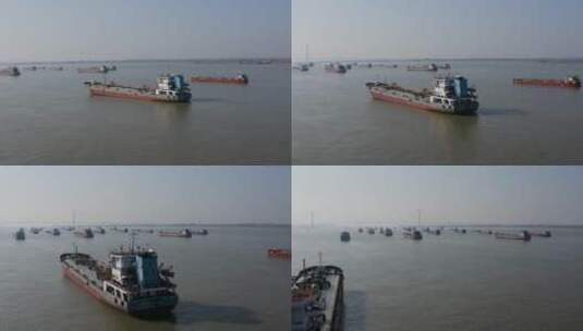 航拍南京栖霞山大桥下过往的船只高清在线视频素材下载
