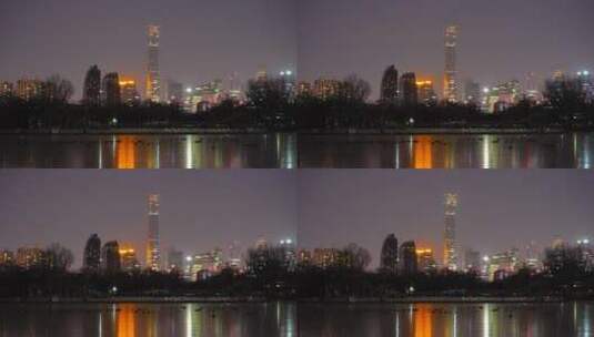 北京CBD夜晚冰面上的倒影和鸭子高清在线视频素材下载