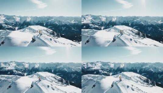 登山者站在雪山顶高清在线视频素材下载