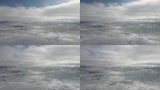 航拍云海下的高原绝美雪景高清在线视频素材下载