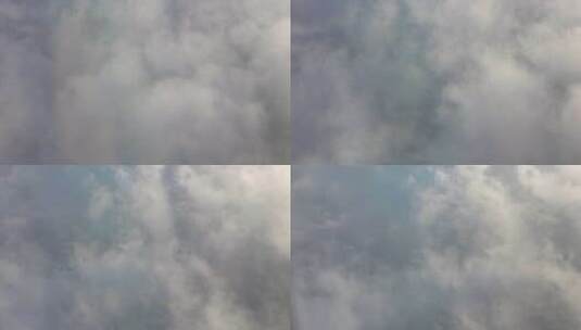 从飞机上看移动的云。白天，蓝天。高清在线视频素材下载