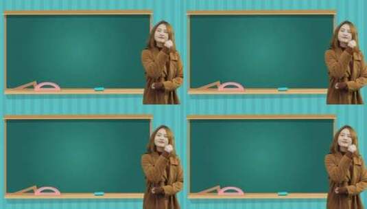 女教师站在黑板前做思考的动作高清在线视频素材下载