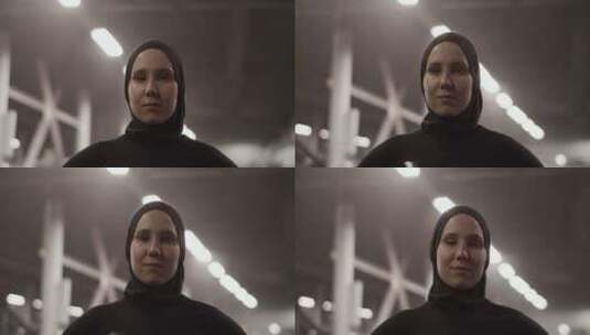 穆斯林女运动员看着相机高清在线视频素材下载
