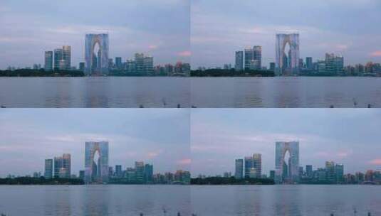 苏州金鸡湖和东方之门城市建筑风光高清在线视频素材下载