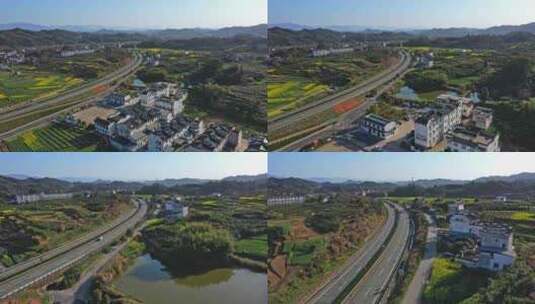 油菜花田里的高速公路高清在线视频素材下载