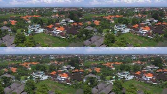 郁郁葱葱的巴厘岛郊区景观中的豪华别墅高清在线视频素材下载