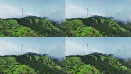 春天阳光下桂林高山上的云雾和风力发电风车高清在线视频素材下载
