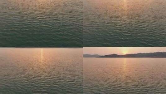 夕阳下波光粼粼的湖面高清在线视频素材下载