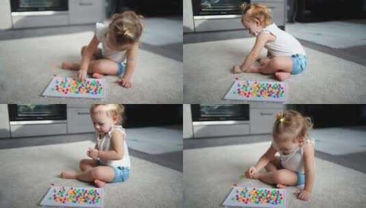 漂亮的小女孩在家玩蘑菇指甲马赛克高清在线视频素材下载