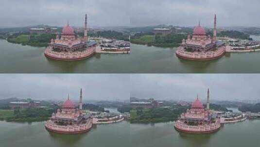 马来西亚布城粉色水上清真寺建筑景观航拍高清在线视频素材下载