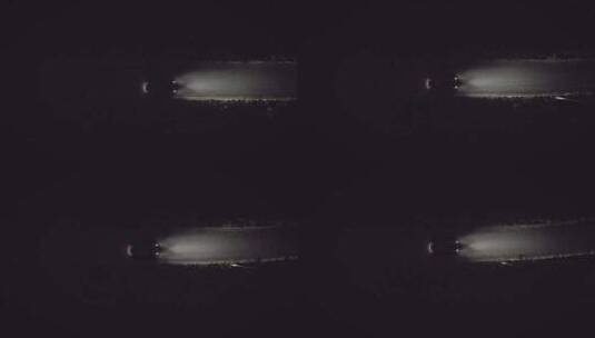 【4K】汽车行驶在黑暗道路用车灯照亮前方高清在线视频素材下载