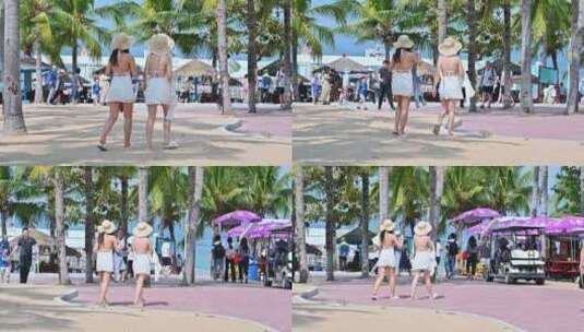 海南三亚西岛行走在沙滩的亚洲美女高清在线视频素材下载