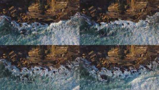 海浪拍打在悬崖峭壁上的慢动作高清在线视频素材下载