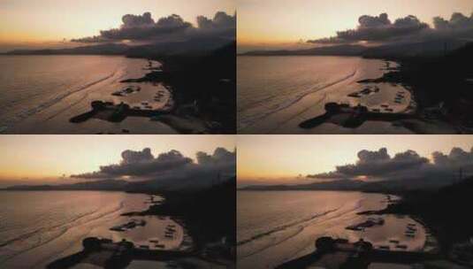 印度尼西亚日落后巴厘岛海岸的鸟瞰图高清在线视频素材下载