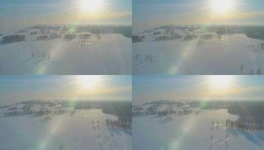 寒冷冬季景观的鸟瞰图北极田野树木覆盖着霜高清在线视频素材下载