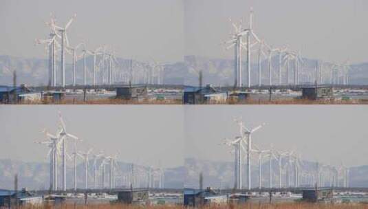 山东荣成港西环海公路上的风力发电机群4高清在线视频素材下载