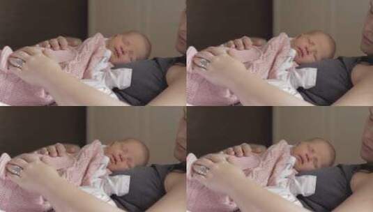 母亲在和新生儿睡觉高清在线视频素材下载