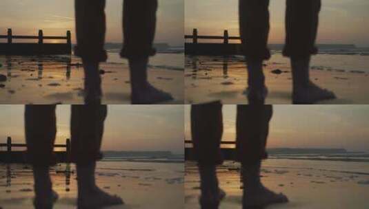 男人光脚站在沙滩上高清在线视频素材下载