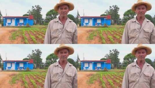 一名古巴农民站在农场的农舍前高清在线视频素材下载