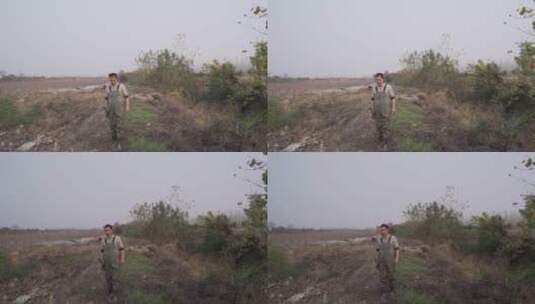 藕农在自己的藕塘中挖藕高清在线视频素材下载