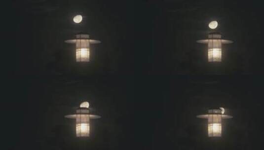 月亮在路灯后落下延时视频，月落高清在线视频素材下载