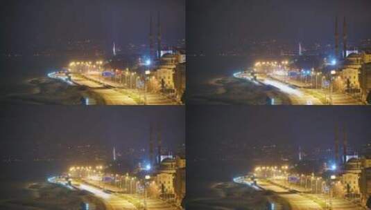 城市夜灯在海边的路上高清在线视频素材下载