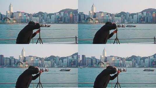 香港维多利亚港拍照的摄影师高清在线视频素材下载