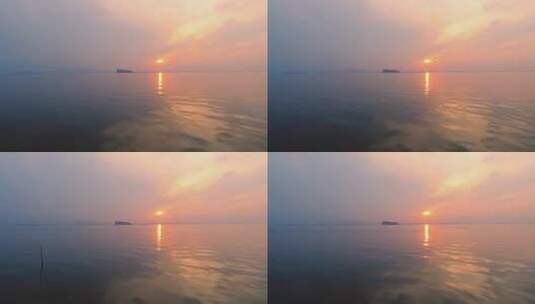 江西九江鄱阳湖丰水期夏季黄昏鞋山日落航拍高清在线视频素材下载