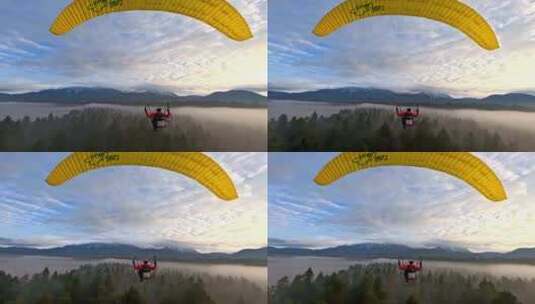 FPV无人机航拍动力滑翔伞飞行森林高山湖泊高清在线视频素材下载