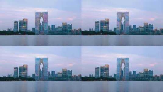苏州金鸡湖和东方之门城市建筑风光高清在线视频素材下载