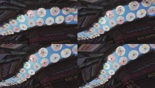 丽江古城油纸伞街风光高清在线视频素材下载