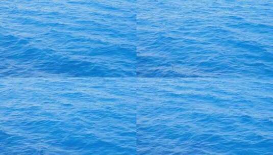 平静大海的背景。小波浪的海靠近。海水背景。蓝色的海和小高清在线视频素材下载