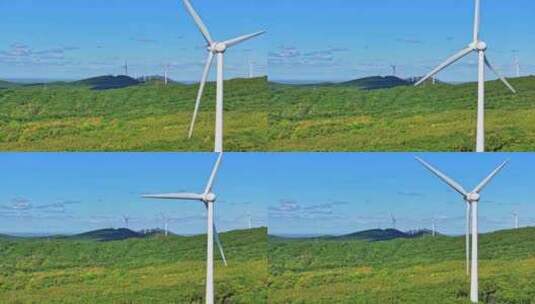 航拍山上的风能风力发电场风车高清在线视频素材下载