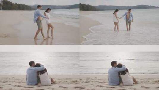 情侣手牵手在沙滩上散步拥抱高清在线视频素材下载