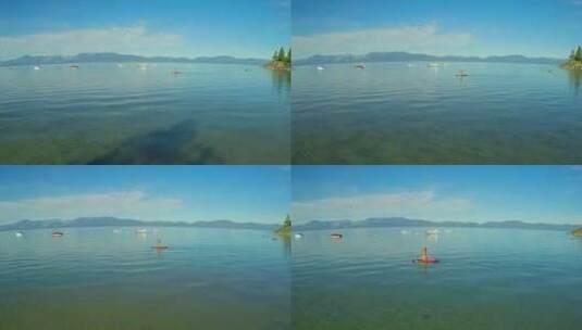 航拍在太浩湖上划船的女人高清在线视频素材下载