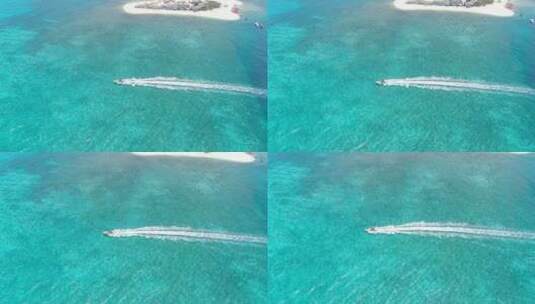 西沙群岛南海岛礁小船航拍高清在线视频素材下载