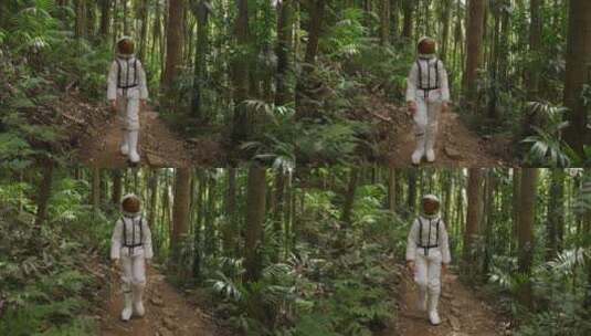 穿着宇航服的小男孩走在森林小路上高清在线视频素材下载