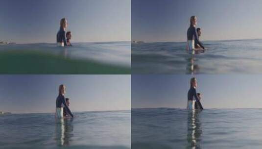 海上冲浪板上的情侣高清在线视频素材下载