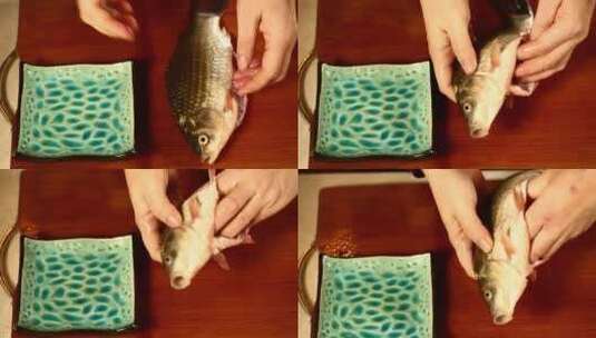 剖开鲫鱼肚子取出鱼籽高清在线视频素材下载