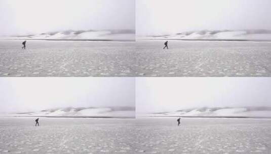 男子独自徒步走过寒冷荒原高清在线视频素材下载