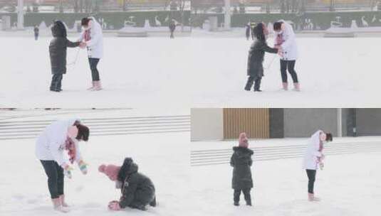 母女在雪地里玩耍 打雪仗冬季雪天高清在线视频素材下载